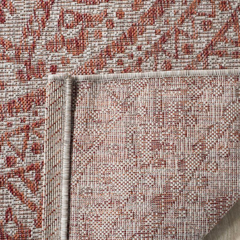 Light Beige and Terracotta Geometric Synthetic Runner Rug