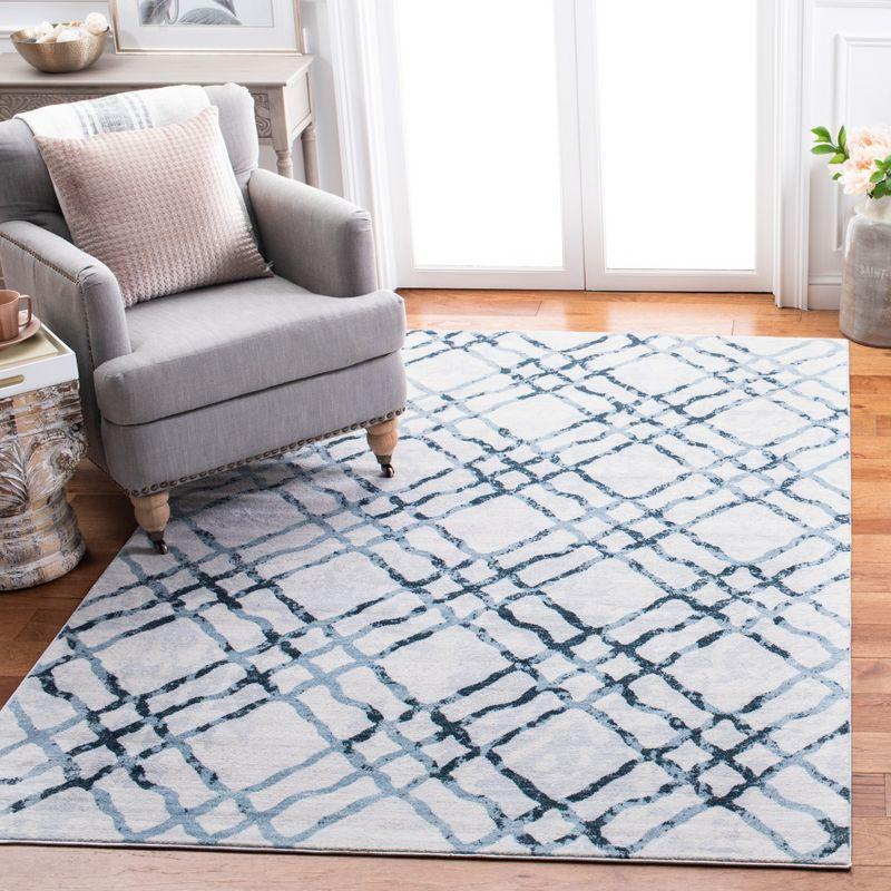 Ivory and Turquoise Geometric Tufted Wool Area Rug