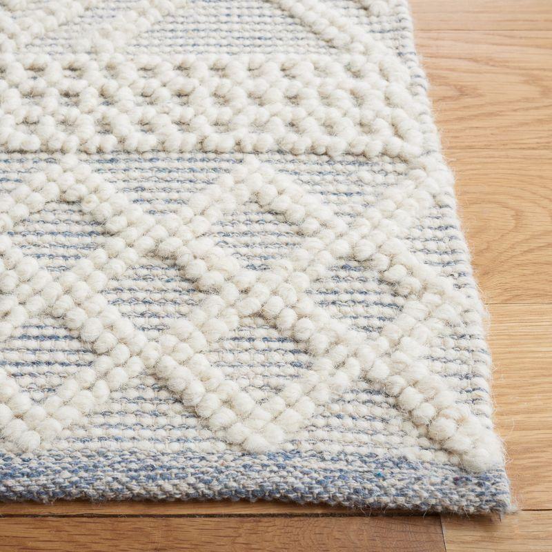 Ivory and Blue Hand-tufted Wool Cotton Blend 8' x 10' Area Rug