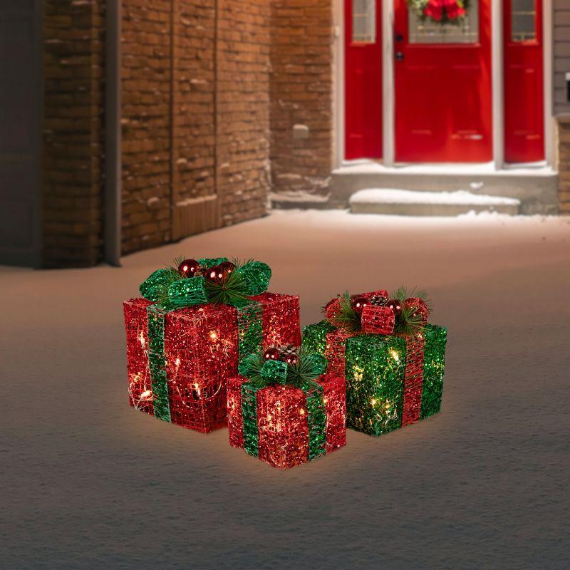 Northlight Seasonal Set of 3 Lighted Red and Green Tinsel Gift Boxes with Bows Christmas Outdoor Decorations 10"