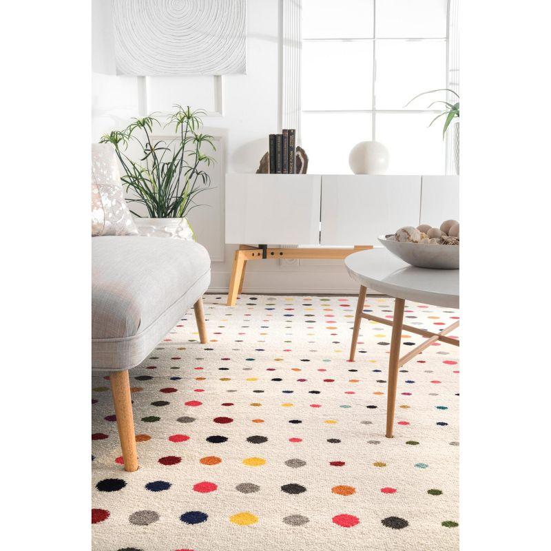 Dorie Multicolor Polka Dot 6'7" x 9' Synthetic Area Rug