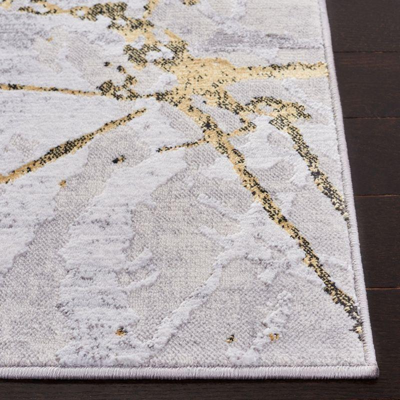 Grey and Gold 8' x 10' Reversible Washable Synthetic Area Rug