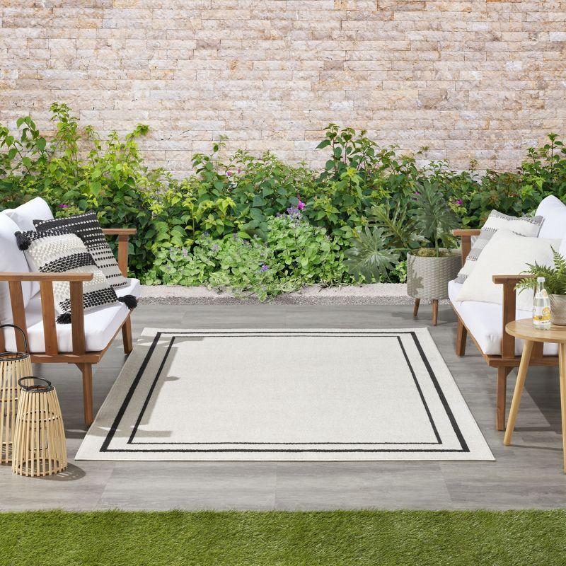 Nourison Essentials Bordered Indoor Outdoor Area Rug