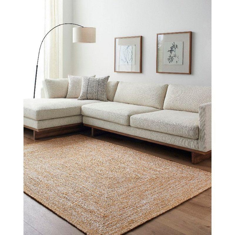 Ivory and Mustard Geometric Synthetic 5' x 7'6" Area Rug