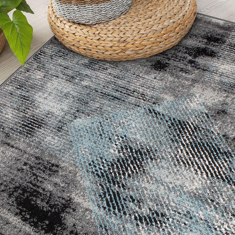 Reversible Geometric Black Synthetic 5' x 7' Area Rug