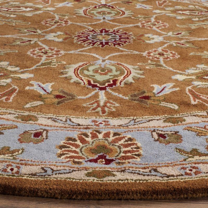 Heritage HG812 Hand Tufted Area Rug - Brown/Blue - 4'6"x6'6" Oval - Safavieh.