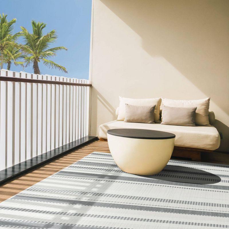 Gray and Cream Striped Synthetic 5' x 7' Indoor/Outdoor Rug