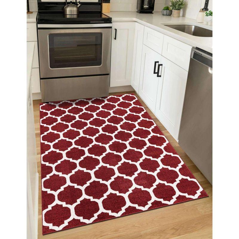 Red and Orange Synthetic Trellis Indoor Area Rug