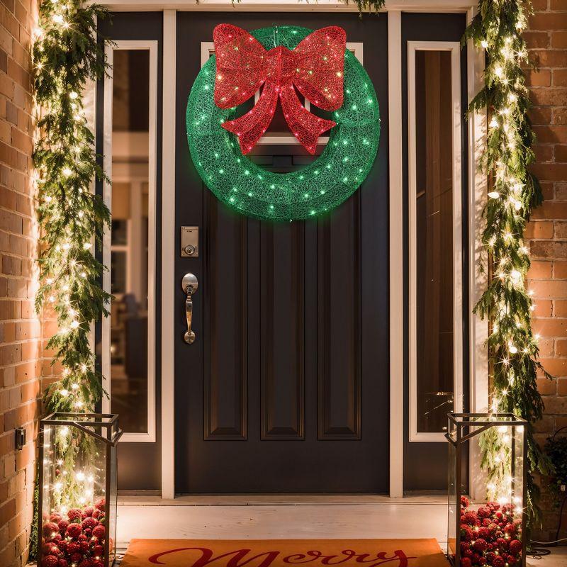 LuxenHome 3Ft Round Lighted Green Wreath with Red Bow Outdoor Holiday Decoration