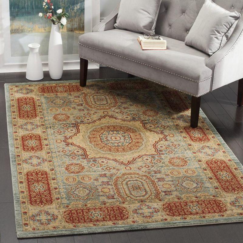 Red and Beige Rectangular Synthetic Area Rug