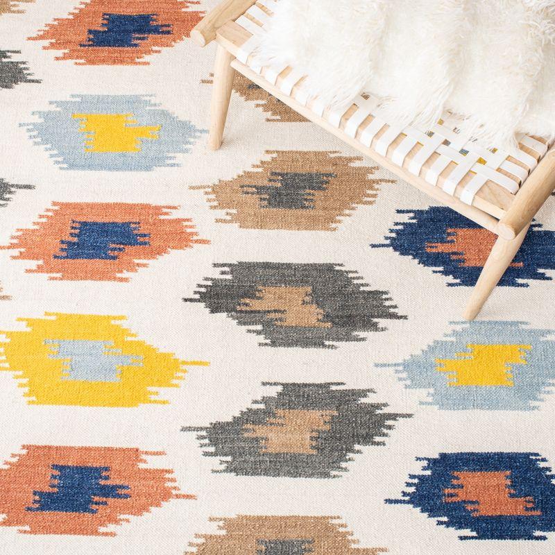 Dhurries DHU648 Hand Woven Area Rug - Ivory/Multi - 6'x9' - Safavieh.