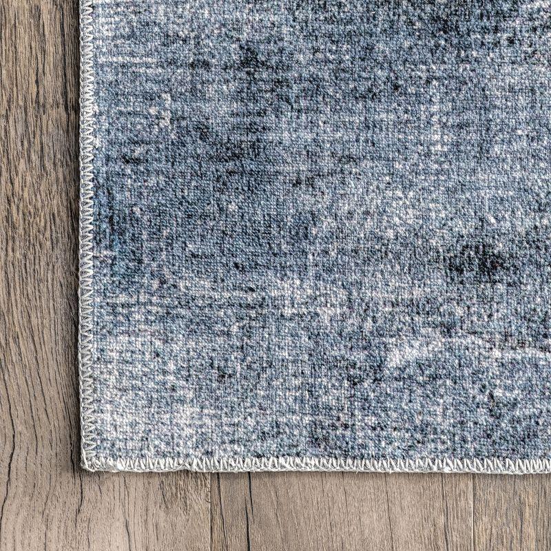 Sustainably-Sourced Blue Abstract 5' x 8' Washable Area Rug