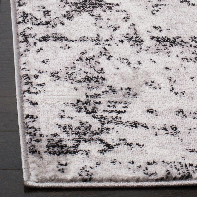 Ivory & Charcoal Abstract Synthetic 9' x 12' Easy-Care Area Rug