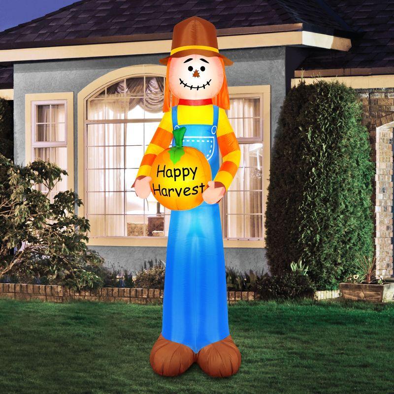 Multicolored Inflatable Harvest Scarecrow with Pumpkin, 7.5 ft Tall