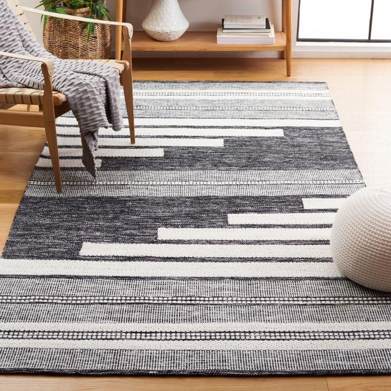 Bohemian Ivory and Black Handwoven Synthetic Stripe Area Rug 4' x 6'