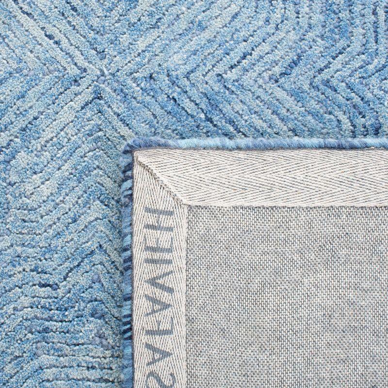 Ikat IKT506 Hand Tufted Area Rug - Blue - 5'x8' - Safavieh