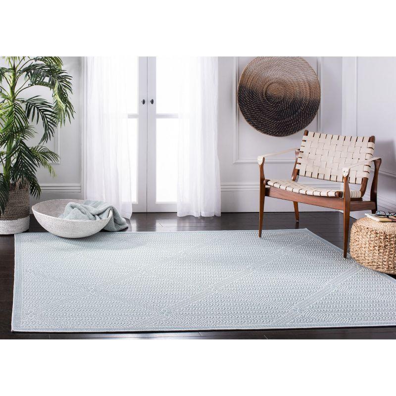 Light Blue Diamond Pattern Round Synthetic Rug