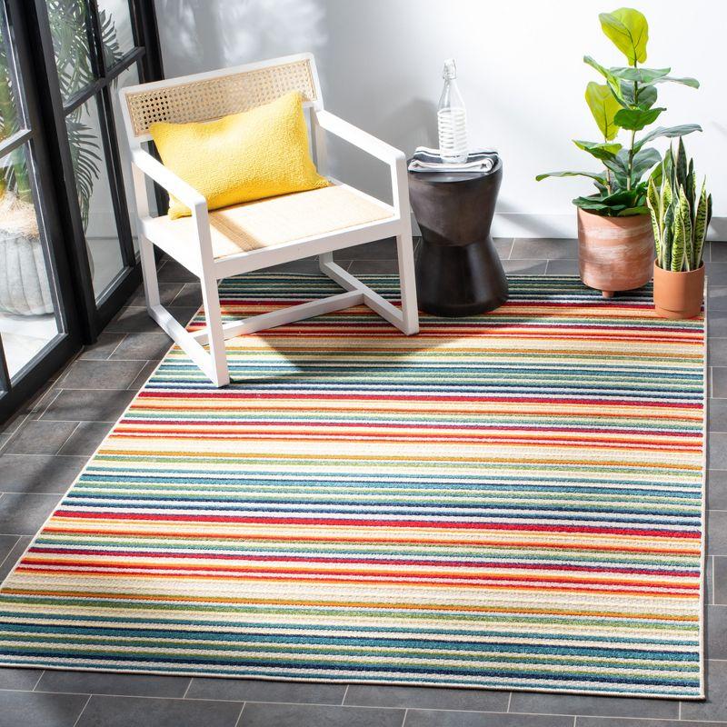 Ivory and Green Striped Synthetic Indoor/Outdoor Area Rug