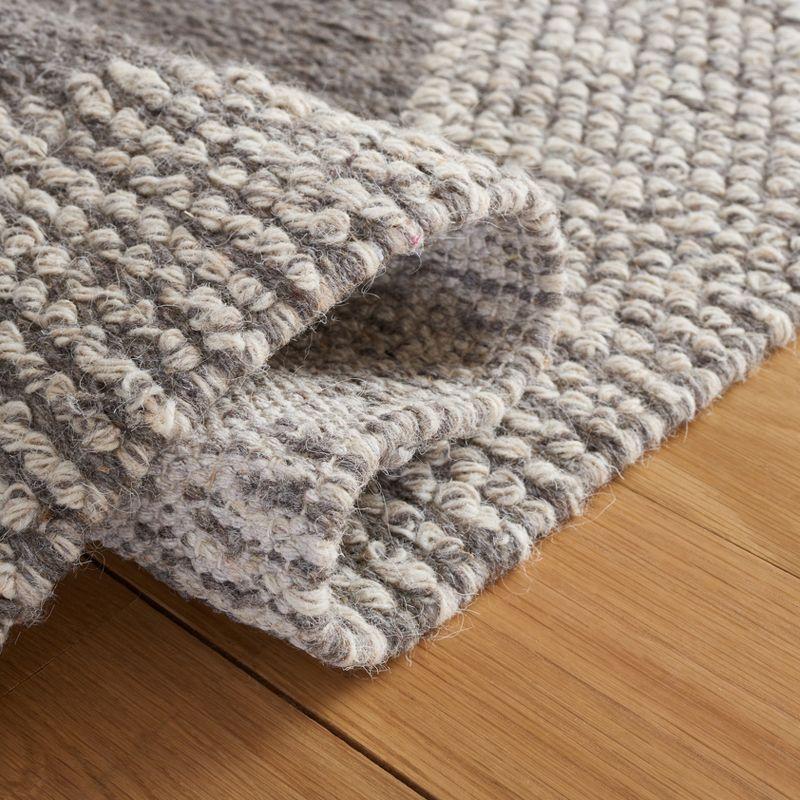 Ivory and Beige Hand-Woven Wool Area Rug - 3' x 5'