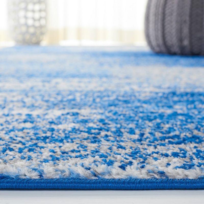 Reversible Silver and Blue Abstract Synthetic Area Rug