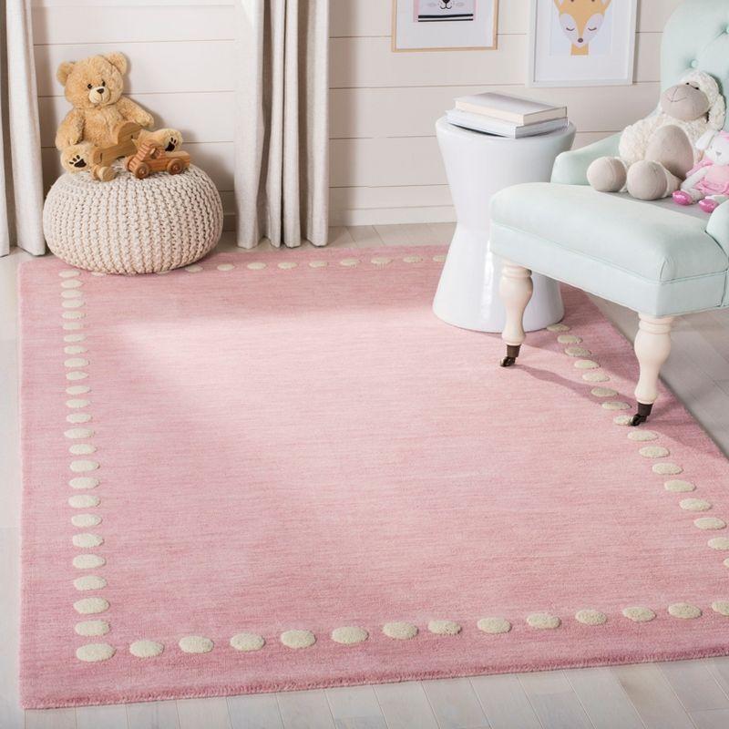 Safavieh Kids SFK802 Hand Loomed Indoor Area Rug - Pink - 5'x8' - Safavieh