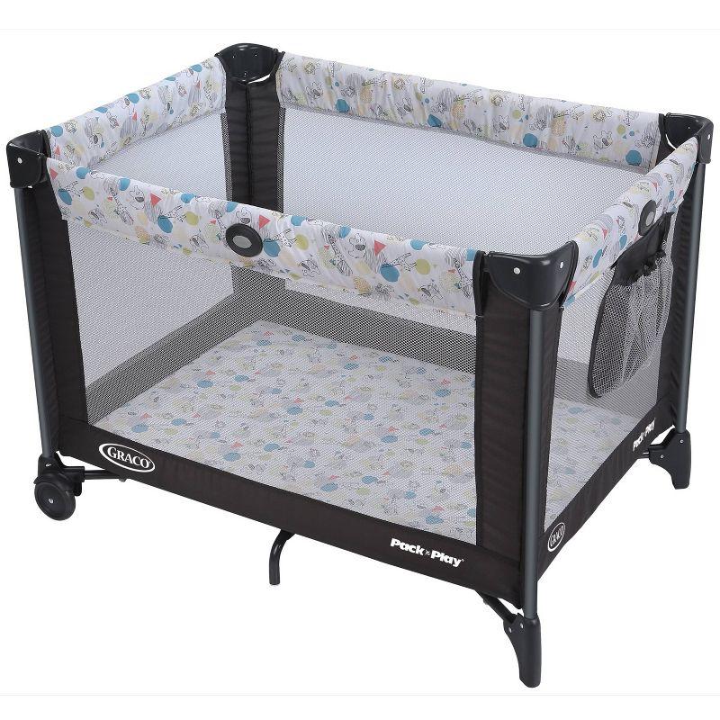 Compact Black and White Portable Playard with Mesh Sides