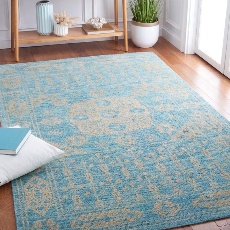 Turquoise Tribal Chic Wool 3' x 5' Hand-Knotted Rug