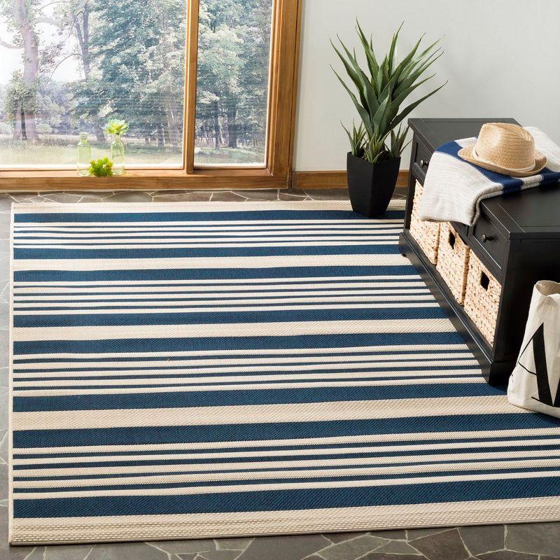 Courtyard CY6062 Power Loomed Indoor/Outdoor Area Rug - Navy/Beige - 6'7"x9'6" - Safavieh.