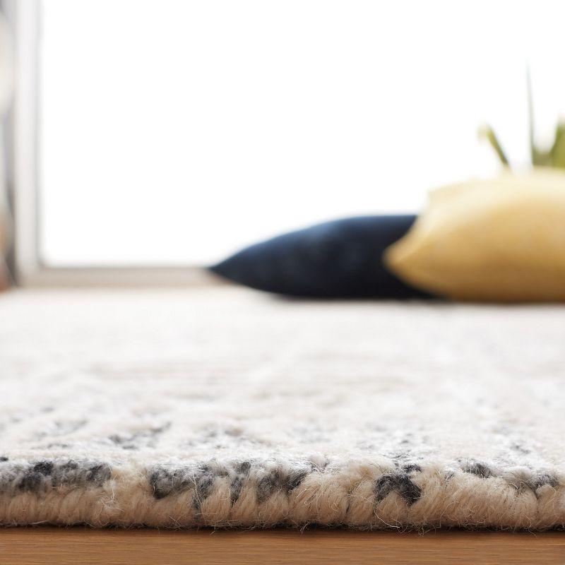 Ivory and Grey Hand Tufted Wool and Viscose Area Rug