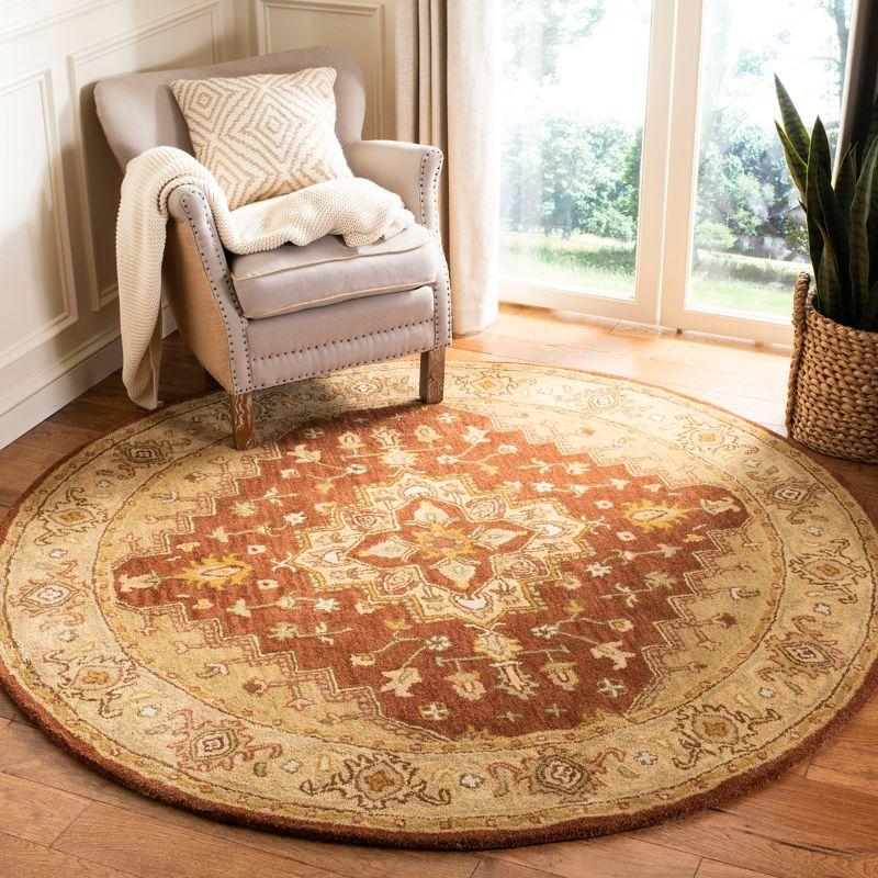 Hand-Tufted Elegance Round Wool Area Rug in Rust Red, 6' Diameter