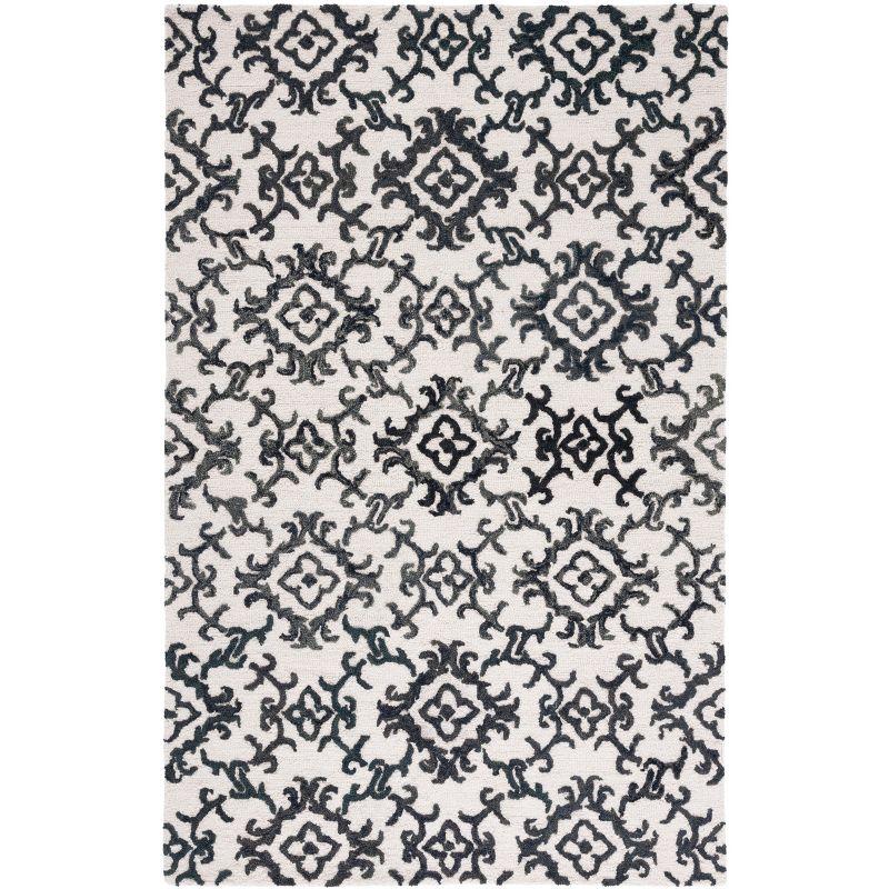 Blossom BLM104 Hand Tufted Area Rug - Ivory/Black - 8'x10' - Safavieh.