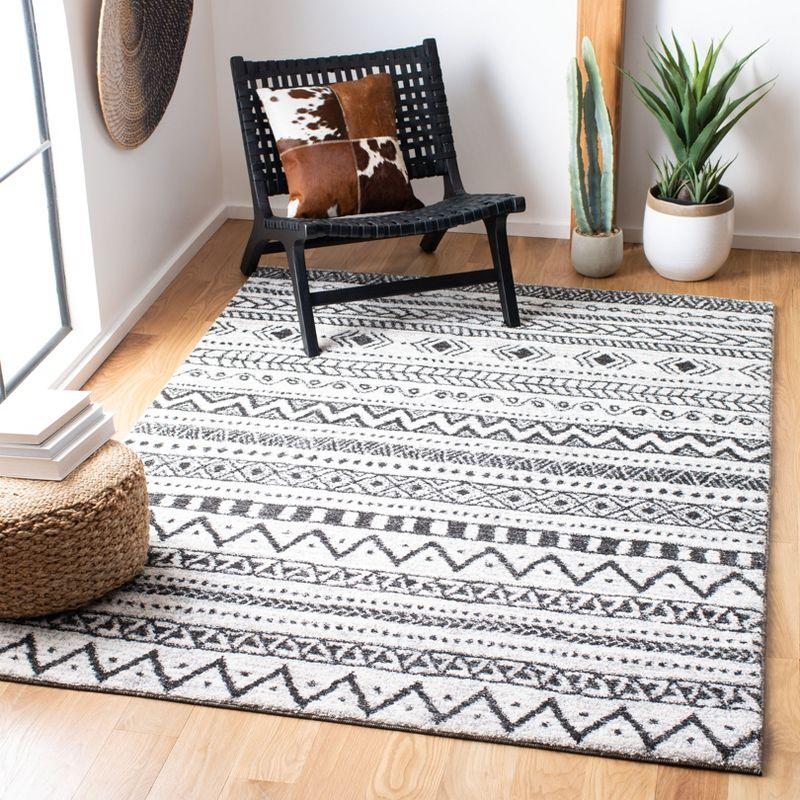 Tunisia TUN735 Power Loomed Area Rug - Ivory/Black - 8'x10' - Safavieh.