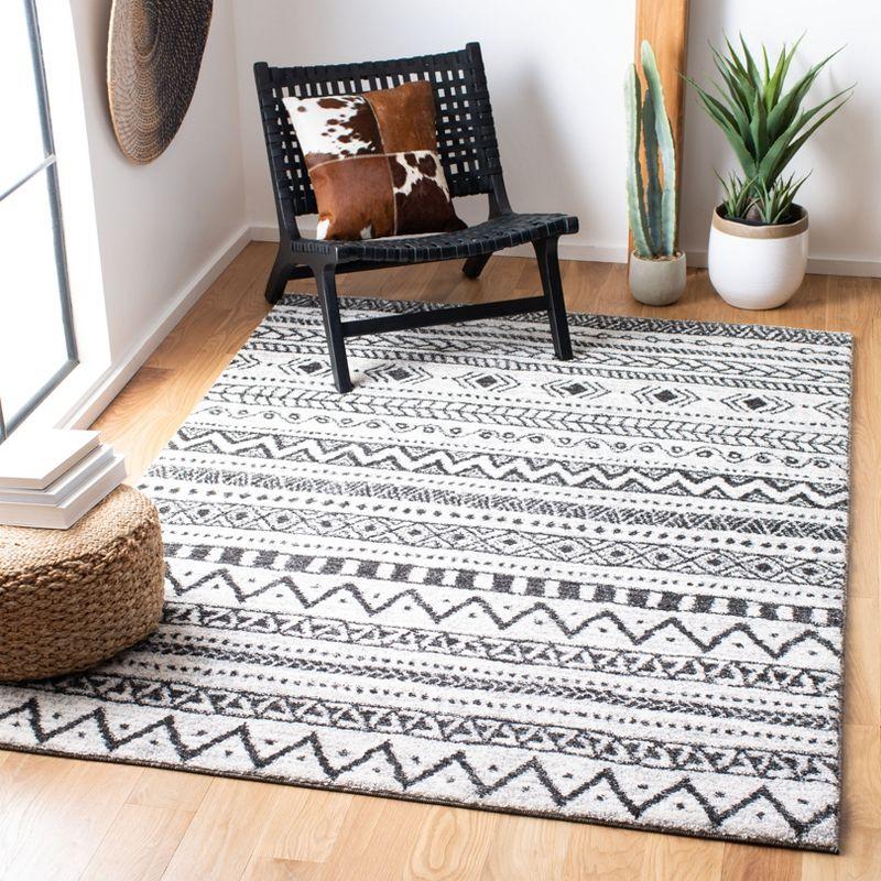 Berber Tribes Inspired 4' x 6' Black Geometric Synthetic Area Rug