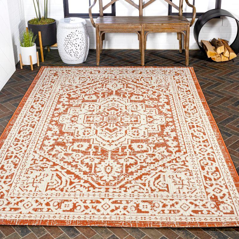 9' x 12' Sinjuri Medallion Textured Weave Indoor/Outdoor Area Rug, Orange/Cream - JONATHAN Y