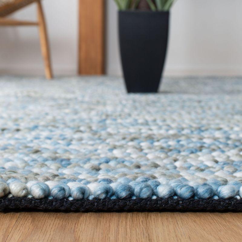 Hand-Tufted Blue and Ivory Wool Area Rug, 8' x 10'