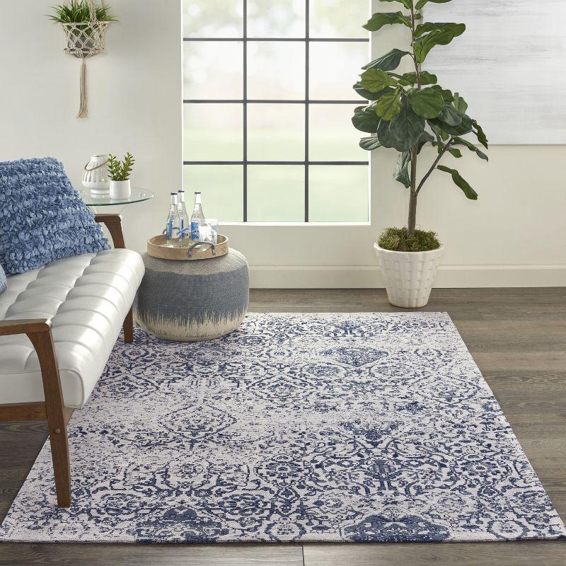 Williston Forge Damask Southwestern Machine Made Power Loom Polypropylene Indoor / Outdoor Area Rug in Ivory/Navy