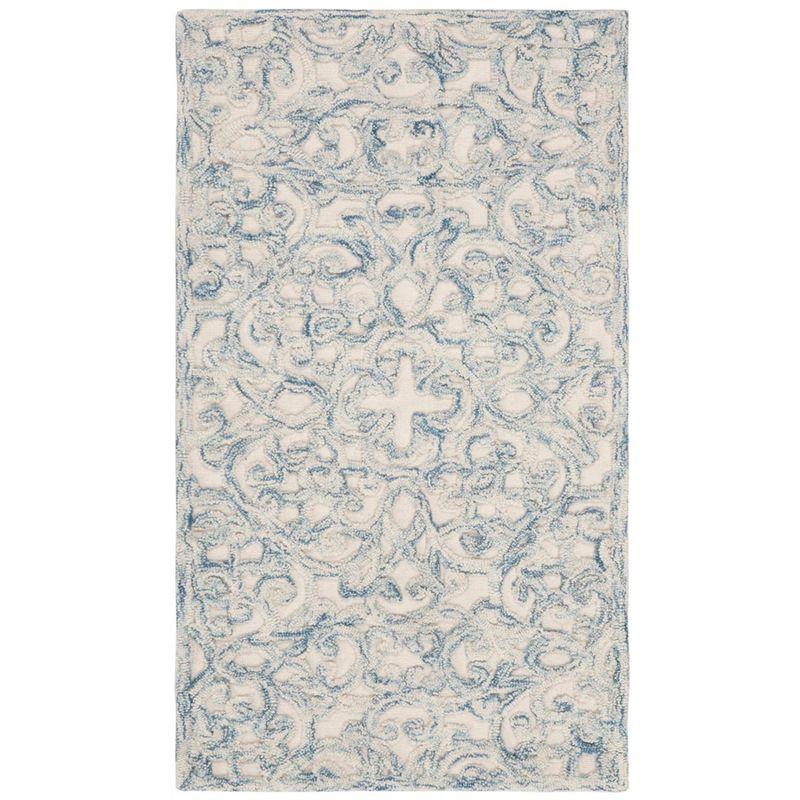 Trace TRC103 Hand Tufted Indoor Accent Rug - Blue/Ivory - 2'3"x4' - Safavieh.