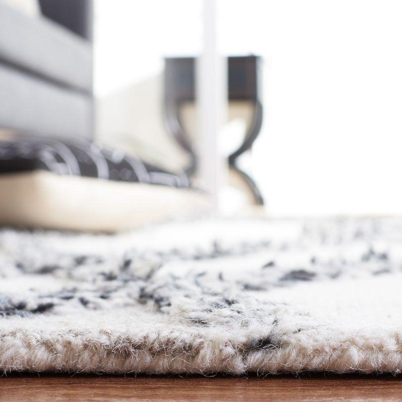 Casablanca CSB977 Hand Tufted Area Rug - Ivory/Black - 6'x9' - Safavieh.