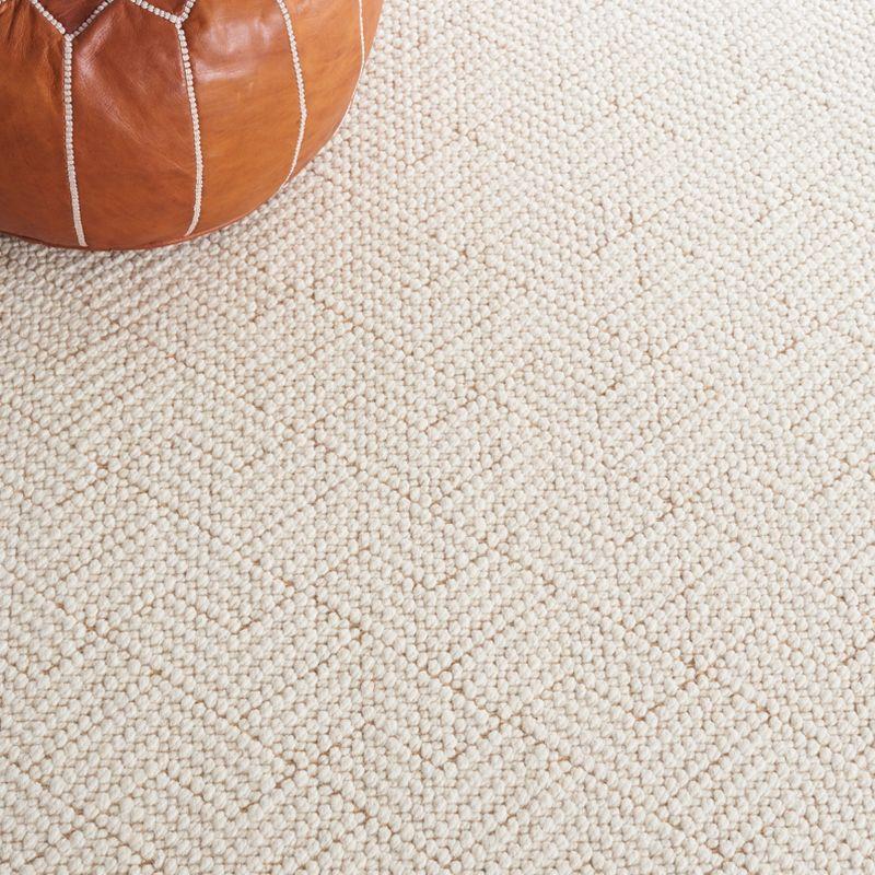 Handwoven Ivory Wool 8' x 10' Rectangular Area Rug