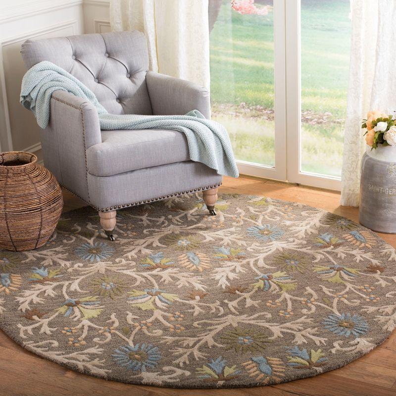 Cambridge 4' Round Ivory and Moss Hand-Tufted Wool Rug