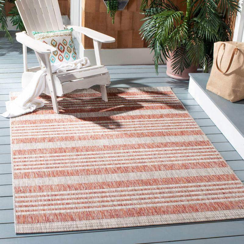 Red and Beige Striped Synthetic Indoor/Outdoor Area Rug