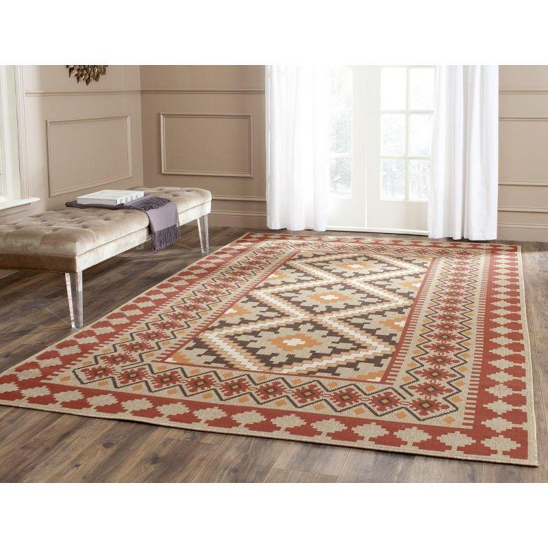 Ratia Red/Natural Synthetic 5' x 7' Easy-Care Indoor/Outdoor Rug