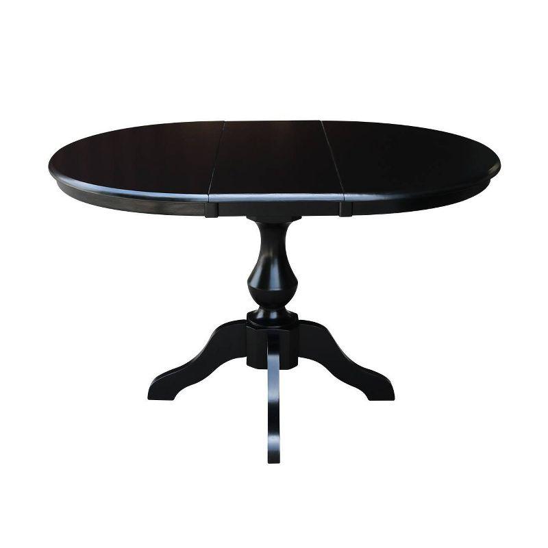 Elegant Black Wood Round Extendable Dining Table with Pedestal Base