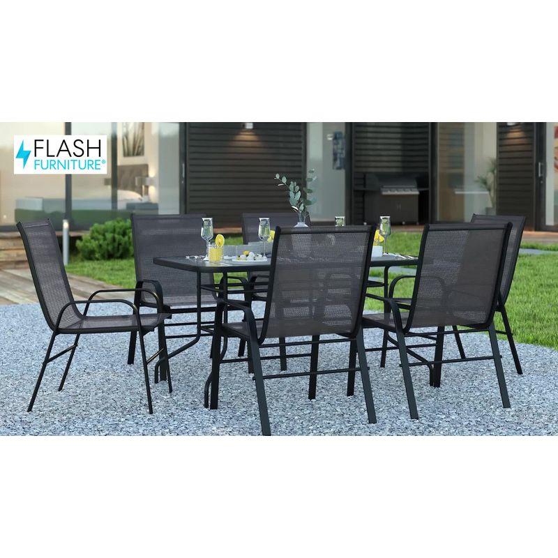 Flash Furniture 7 Piece Outdoor Patio Dining Set - 55" Tempered Glass Patio Table with Umbrella Hole, 6 Gray Flex Comfort Stack Chairs