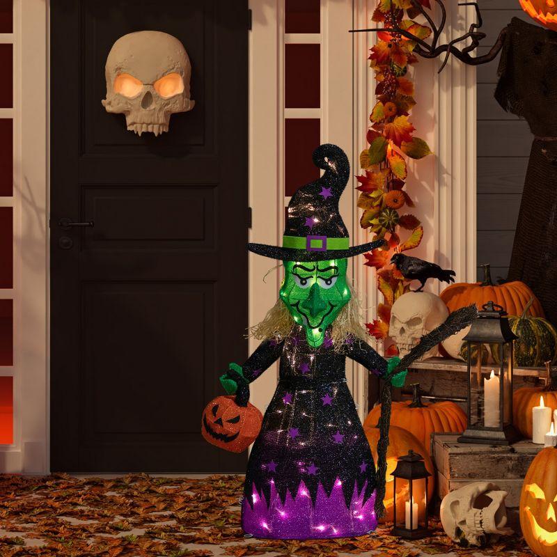 Northlight LED Lighted Witch with Broom Outdoor Halloween Decoration - 39"  - Clear Lights