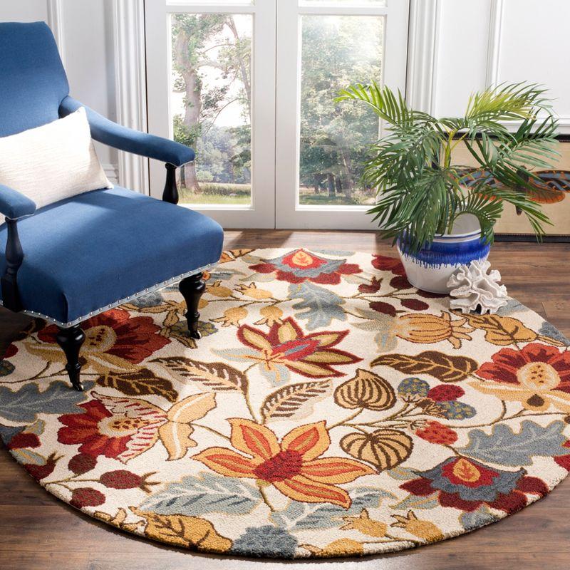 Blossom BLM863 Hand Hooked Area Rug - Ivory/Multi - 6' Round - Safavieh.