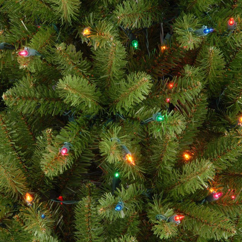 National Tree Company 6.5 ft Artificial Pre-Lit Slim Christmas Tree, Green, Kingswood Fir, Multicolor Lights, Includes Stand