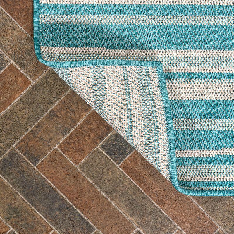 4' x 6' Castara Wavy Stripe Modern Indoor/Outdoor Area Rug, Aqua/Cream - JONATHAN Y