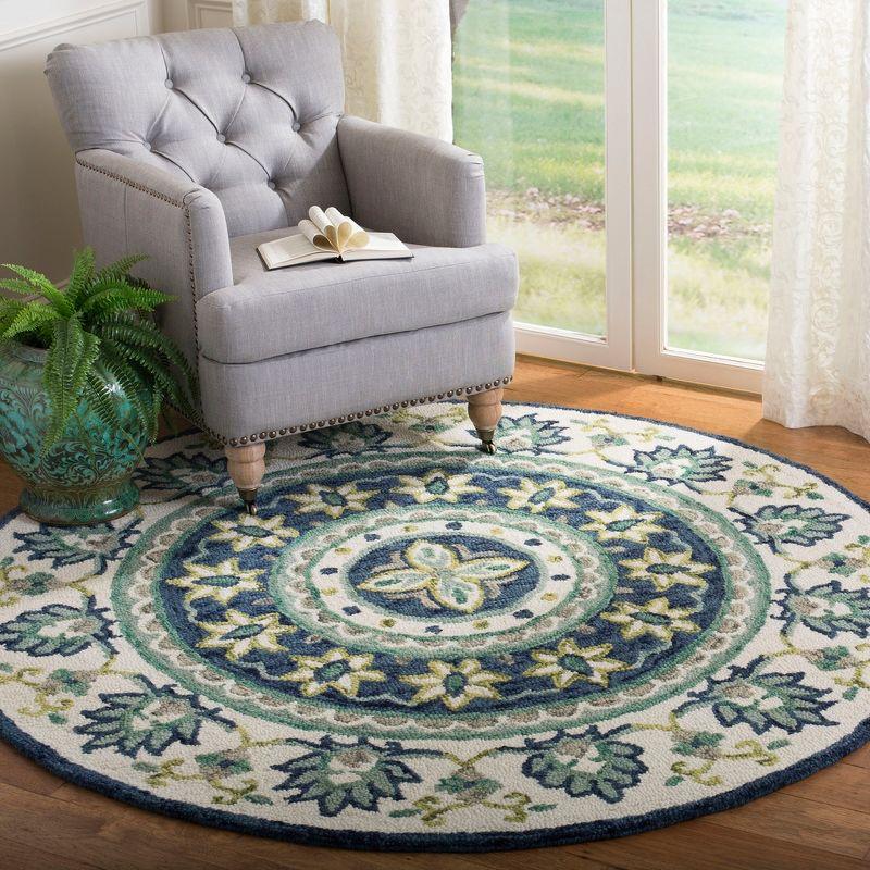 Ivory and Blue Floral Round Wool Area Rug