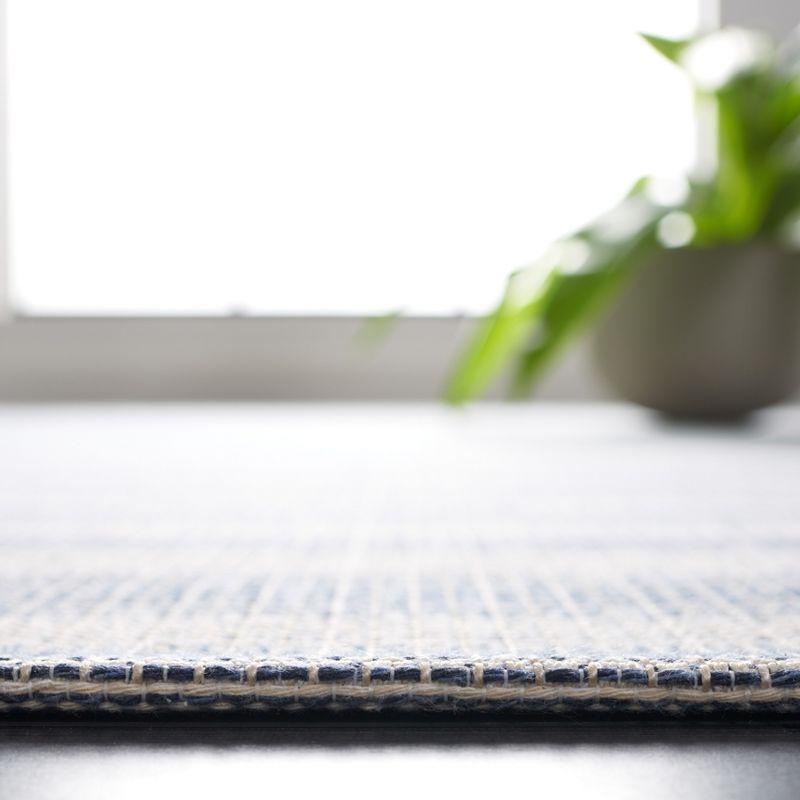 Augustine AGT501 Machine Made Indoor Area Rug - Ivory/Navy - 5'x7'-7" - Safavieh